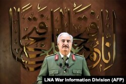 LIBYA-- Military strongman Khalifa Haftar gives a speech, saying he had "a popular mandate" to govern the country, declaring a key 2015 political deal over and vowing to press his assault to seize Tripoli, April 27, 2020.