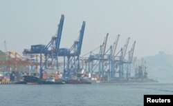 A general view shows a commercial port in Vladivostok, Russia, July 27, 2014.