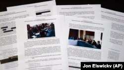 U.S. -- mueller -- Special counsel Robert Mueller's redacted report on the investigation into Russian interference in the 2016 presidential election is photographed Thursday, April 18, 2019, in Washington.