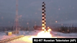 RUSSIA -- In this video grab provided by RU-RTR Russian television via AP television on March 1, 2018, Russia's new Sarmat intercontinental ballistic missile blasts off during a test launch from an undisclosed location in Russia.