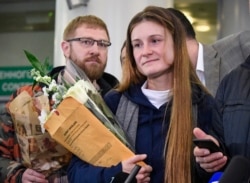 RUSSIA -- Maria Butina, who served nine months in a U.S. jail for acting as a Russian government agent arrives at Moscow's Sheremetyevo airport on October 26, 2019, a day after her release from prison.