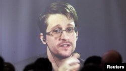 Argentina -- Edward Snowden speaks via video link during a conference at University of Buenos Aires Law School, November 14, 2016