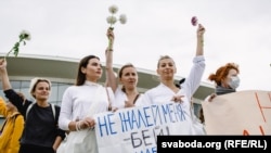 BELARUS — Women protest in Minsk, Kamarouka, Aug. 12, 2020.