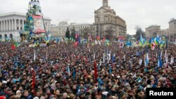 Supporters of EU integration are seen at a rally at Independence Square in central Kyiv, December 8, 2013.