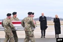 U.S. President Joe Biden and First Lady Jill Biden attend the dignified transfer of the remains of three U.S. service members killed in the drone attack on the US military outpost in Jordan, at Dover Air Force Base in Dover, Delaware, on February 2, 2024. (Roberto Schmidt//AFP)