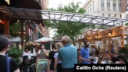 People enjoy going out in New York City as CDC eases COVID-19 guidance on social distancing for those vaccinated. Manhattan borough of New York City, U.S., May 23, 2021.