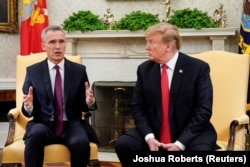 U.S. -- NATO Secretary General Jens Stoltenberg speaks while meeting with U.S. President Donald Trump in the Oval Office at the White House in Washington, U.S., April 2, 2019