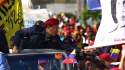 VENEZUELA – Venezuelan President Hugo Chavez greets supporters who participated to a parade in Maracay, 100 km southeast of Caracas, Venezuela, 04 February 2001.