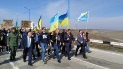 Action to mark the sixth anniversary of the annexation of Crimea at the Kalanchak checkpoint of entry and exit in Ukraine's Kherson Region, March 3, 2020.
