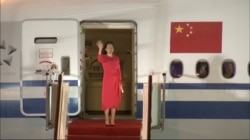 Huawei Technologies Chief Financial Officer Meng Wanzhou waves upon arriving from Canada at Shenzhen Baoan International Airport, in Shenzhen on September 25, 2021. (CCTV via Reuters)