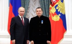 Russia. Moscow. December 26th. Russian President Vladimir Putin and TV presenter Vladimir Solovyov (left to right), at the state awards ceremony in the Kremlin, Dec. 26, 2019.