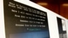 A screenshot of a tutorial posted online by Russian hacker Roman Seleznev on how to steal credit card data is displayed for reporters Friday on April 21, 2017, in Seattle. (Ted Warren/AP)