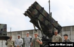 SOUTH KOREA -- US Pacific Command Commanders stand in front of PAC-3 launching station at Osan Air Base in Pyeongtaek, South Korea, 22 August 2017