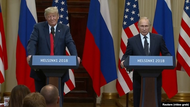 Helsinki, Finland -- Russian President Vladimir Putin and Presidend Donald Trump speak at a joint news conference following their meeting Monday, July 16, 2018.