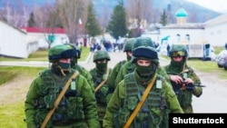 Russian military forces, referred to as "Little Green Men," in Perevalne, Crimea, March 5, 2014.