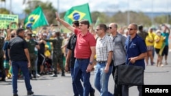 BRAZIL – President Jair Bolsonaro in a protest against quarantine and social distancing measures amid the coronavirus disease outbreak, in Brasilia, on April 19, 2020.