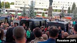 RUSSIA -- People gather for the funerals of five Russian nuclear engineers killed by a rocket explosion in Sarov, August 12, 2019.