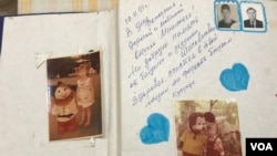 Family scrapbook entry: “To our dear and beloved granddaughter Masha on her Birthday for good memory from her grandmother and grandfather – The Shapovalovs. Be healthy and happy for the joy of your closest relatives." Courtesy: Butina family.