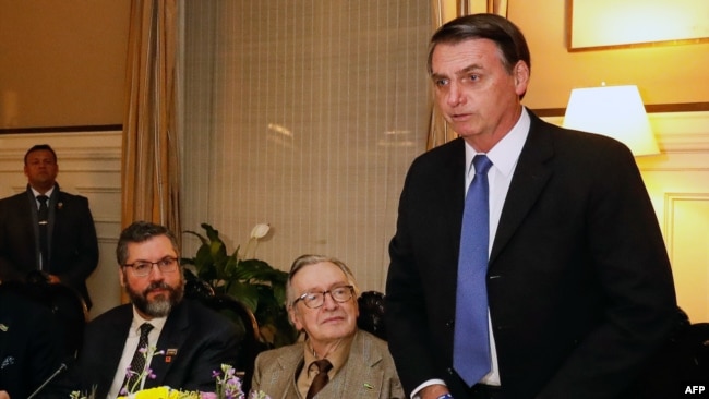 U.S. – Brazilian President Jair Bolsonaro, Olavo de Carvalho and Brazilian Foreign Minister Ernesto Araujo during a meeting at the Brazil embassy in Washington DC, United States, on March 17, 2019.