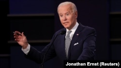 Democratic presidential nominee Joe Biden participates in the first 2020 presidential campaign debate with U.S. President Donald Trump, held on the campus of the Cleveland Clinic at Case Western Reserve University in Cleveland, Ohio, U.S., September 29, 2020.