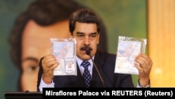 Personal documents are shown by Venezuela's President Nicolas Maduro, May 6, 2020.