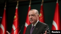 TURKEY – Turkish President Tayyip Erdogan speaks during a news conference, December 14, 2020.