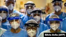 A group of doctors at the Intensive Care Unit of the Hospital de Clinicas in Porto Alegre, Brazil, on April 15, 2020.