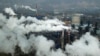 In this Nov. 28, 2019, file photo, smoke and steam rise from a coal processing plant in Hejin in central China's Shanxi Province. (AP/Sam McNeil)