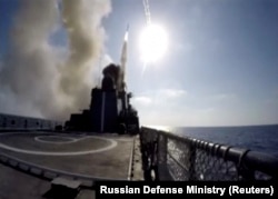 A still image taken from a video footage and released by Russian Defense Ministry on September 5, 2017 shows the Russian frigate Admiral Essen in the Mediterranean Sea firing a Kalibr cruise missile at Islamic State targets near a Syrian city.