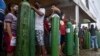 Relatives of COVID-19 patients queue for long hours to refill their oxygen tanks in Manaus, Amazonas state, on January 19, 2021.