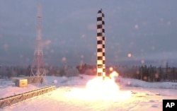 Sarmat intercontinental ballistic missile blasts off during a test launch in Russia.