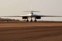 SOUTH AFRICA -- A Russian Air Force Tupolev Tu-160 "Blackjack", a supersonic variable-sweep wing heavy strategic bomber, is parked on the tarmac at the Waterkloof Air force Base in Centurion, south of Pretoria, October 23, 2019