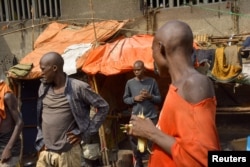Congolese prisoners are seen inside the Kangbayi central prison in Beni, Democratic Republic of Congo, October 20, 2020.