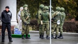 Russian forces without identification (so-called "litte green men") at the airport in Simferopol, Crimea on February 28, 2014.