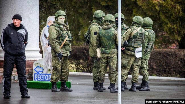 Russian forces without identification (so-called "litte green men") at the airport in Simferopol, Crimea on February 28, 2014.