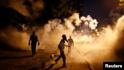 Turkey -- Anti-government protesters clash with riot police in Istanbul, June 2013.