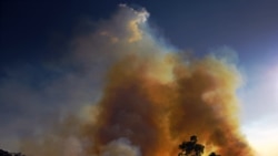 BRAZIL – Smoke rises from an illegally lit fire in Amazon rainforest reserve, south of Novo Progresso in Para state, Brazil, on August 15, 2020.