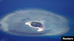 An aerial view of uninhabited island of Spratlys in the disputed South China Sea, April 21, 2017. (Erik De Castro/Reuters)
