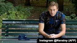 GERMANY -- Russian opposition politician Alexey Navalny sits on a bench while posing for a picture in Berlin, in this undated image obtained from social media Sept. 23, 2020.