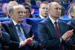 RUSSIA -- Russian President Vladimir Putin (Right) and Federal Security Service Director Alexander Bortnikov (Left) attend a concert marking Russian Security Service Officer Day, in Moscow, Russia, on December 19, 2019.