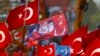 A flag with the picture of Turkey's President Tayyip Erdogan is seen during an August 7, 2016, rally organized by him and allies after a failed military coup. (Osman Orsal/Reuters)