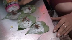 Betel quids are made from areca nuts that are placed in a betel leaf with slaked lime. In Myanmar it’s usually mixed with tobacco. (Dave Grunebaum/VOA)
