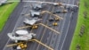 Taiwan war planes are parked on a highway during an exercise to simulate a response to a Chinese attack on its airfields in Changhua in southern Taiwan. (Military News Agency via AP, File)