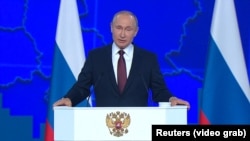 Russian President Vladimir Putin delivers a state-of-the-nation address in Moscow, Russia, Wednesday, Feb. 20, 2019. 