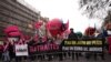 A rally in Paris on January 19, 2023, as workers go on strike over the French president's plan to raise the legal retirement age from 62 to 64. (Thomas SAMSON / AFP)
