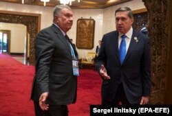 CHINA BELT -- Russian presidential aide Yuri Ushakov (R) speaks with Rosneft CEO Igor Sechin during the Second Belt and Road Forum for International Cooperation in Beijing, China, 26 April 26, 2019