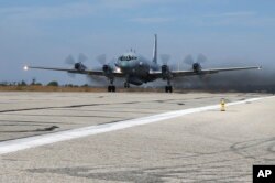 SYRIA -- An Il-20 electronic intelligence plane of the Russian air force takes off from the Russian airbase in Hmeimim, November 12, 2015