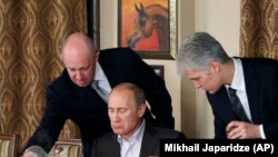 RUSSIA -- Evgeny Prigozhin (L) CEO of Concord Management and Consulting LLC - a defendant in the U.S. Indictment. Moscow, November 11, 2011