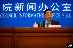 Zeng Yixin, Vice Minister of the Chinese National Health Commission, speaks at a press conference at the Information Office of the State Council in Beijing on Thursday, July 22, 2021. Mark Schiefelbein/AP