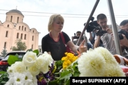 UKRAINE - People lay flowers and light candles at Dutch embassy in Kyiv on July 17, 2018, to remember those killed on flight MH17 four years ago when the plane was shot down over war-torn Ukraine.
